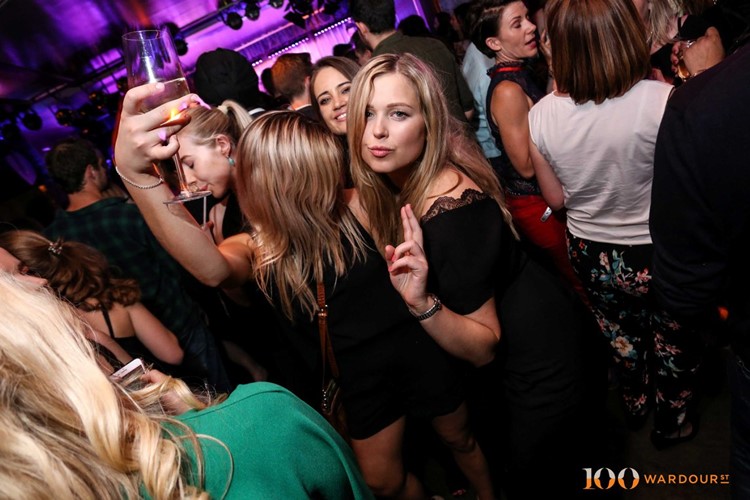 100 wardour st london two blonde pretty girls dancing drinking and having fun dressed in little black dresses