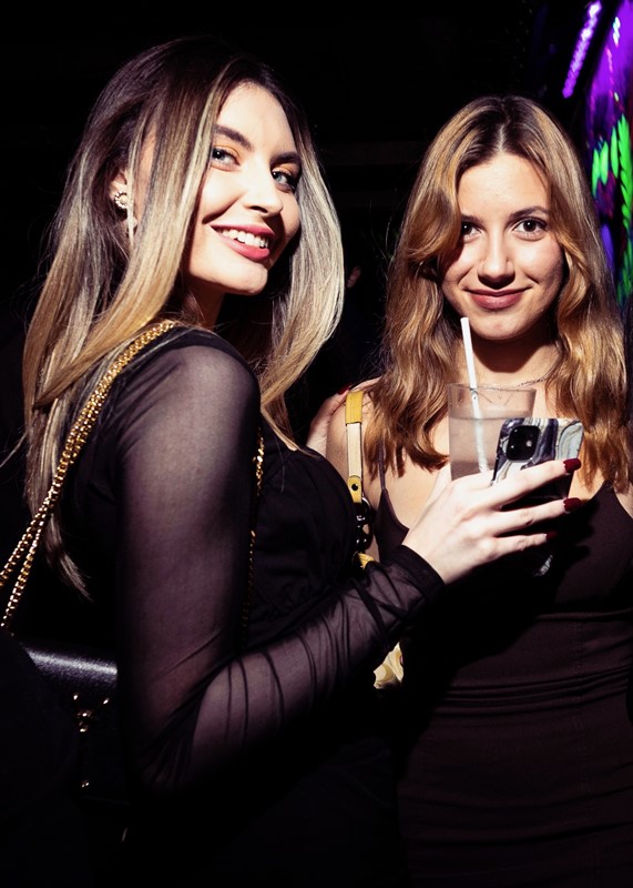 Tonteria nightclub London pretty brunette girl in pink mini dress having fun dresscode best Monday parties