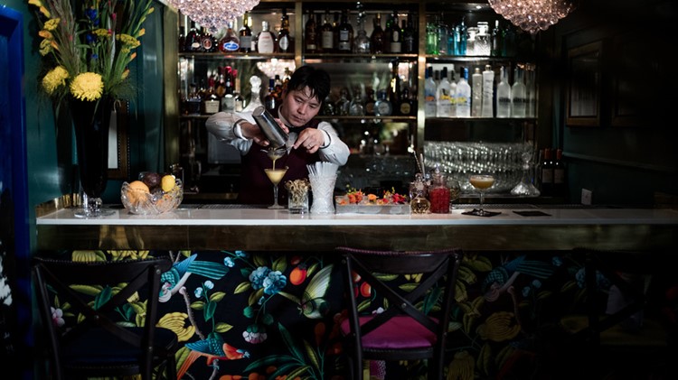 Albert's Club private club in London barman mixing drinks at the bar