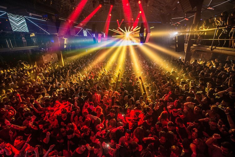 amnesia nightclub ibiza amazing concert music show full crowd dancing and having fun atmosphere colored lights 