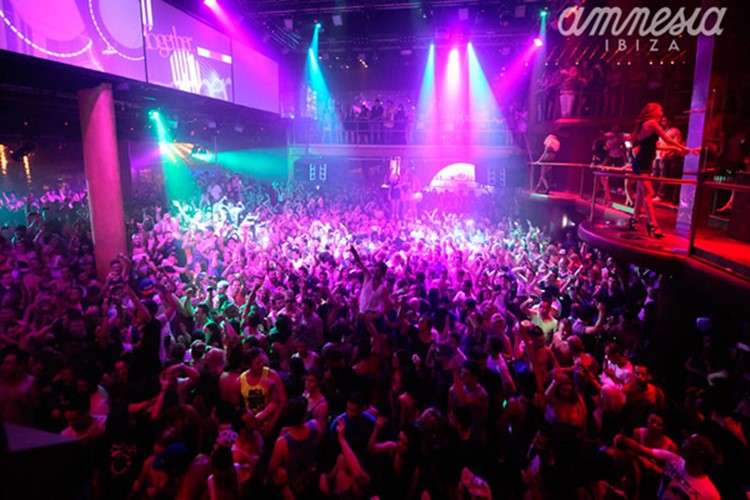 amnesia nightclub ibiza full night show people having fun drinking and dancing at amazing party exotic dancers on balcony club colored lights