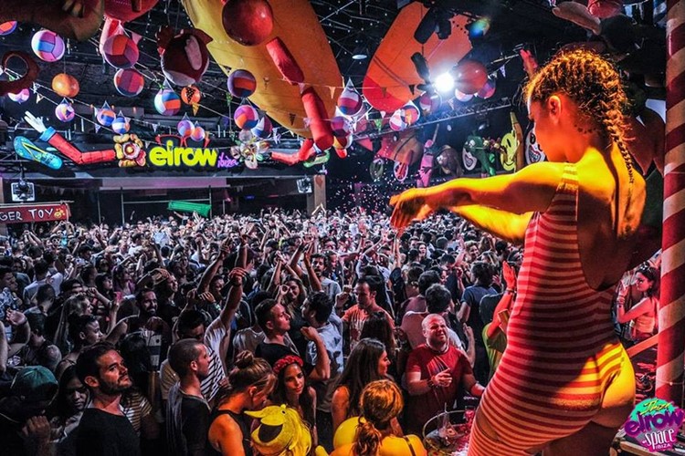 Amnesia nightclub Ibiza sexy dancer dancing for crowd balloons circus themed event