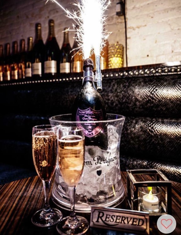 Apres Lounge club New Orleans drinks alcohol bottles vodka table service