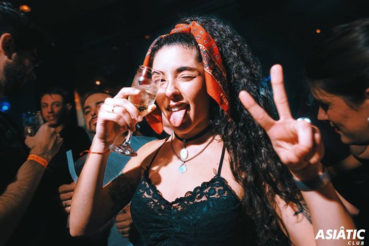 Asia de Cuba nightclub Buenos Aires pretty girl drinking alcohol party