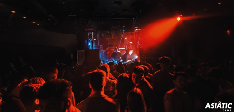 Asia de Cuba nightclub Buenos Aires crowd dancing having fun partying red lights