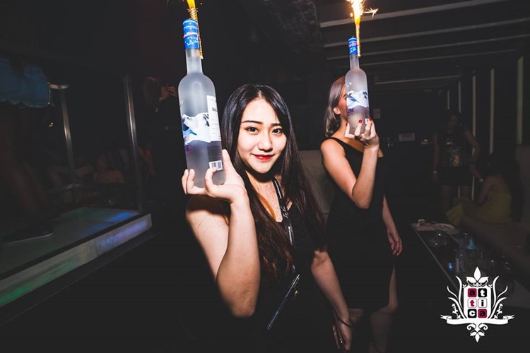 Attica nightclub Singapore pretty waitresses table reservation alcohol bottles service luxury vodka champagne celebrate