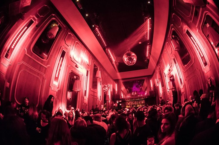 Avenue nightclub New York red lights full crowd