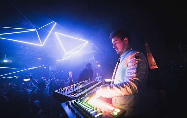 Badaboum nightclub Paris dj mixing music at party event