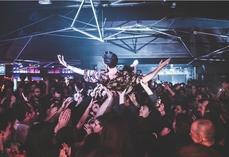 Badaboum nightclub Paris singer being held up in the air by crowd
