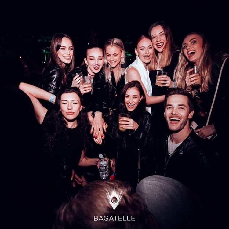 Bagatelle restaurant nightclub Paris people having fun crowd group partying nightout with friends go out to do