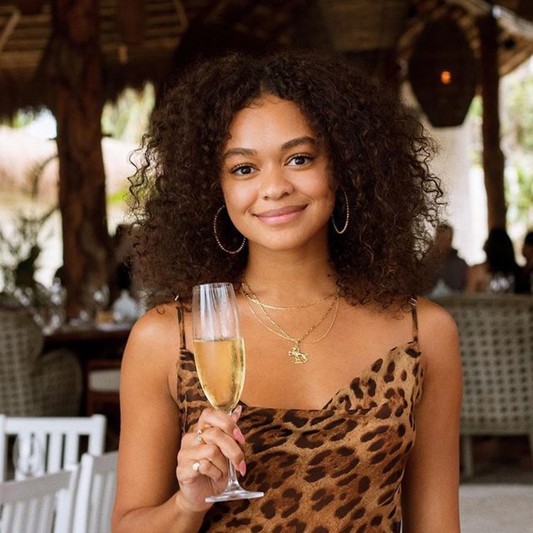 Bagatelle beach club Tulum pretty brunette girl drinking champagne party event fun