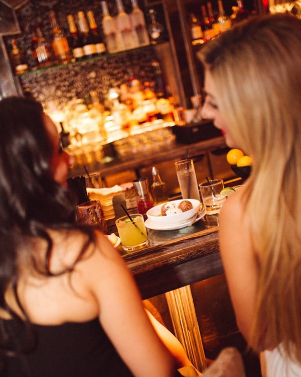 Beauty and Essex day club Los Angeles girls having fun blonde brunette dresscode sexy mini dresses go out today