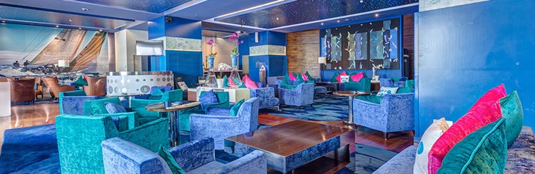 Blue Gin nightclub Monaco view of the inside blue interior design couches lounge area