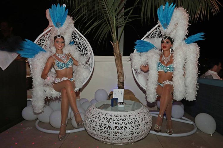 Blue Gin nightclub Monaco two exotic dancers dressed in sexy white and blue lingerie