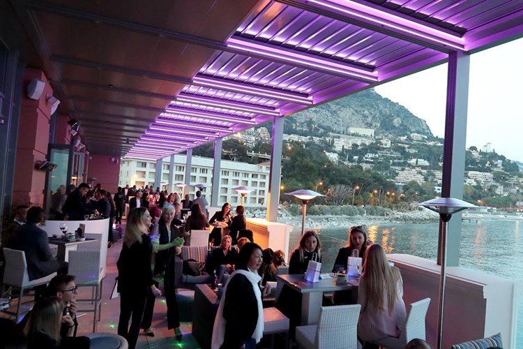 Blue Gin nightclub Monaco view of the club people having drinks at the lounge area