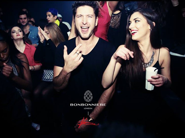 bonbonniere nightclub london brunette girl and boy drinking and having fun