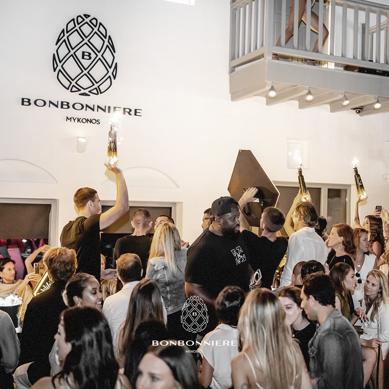 Bonbonniere nightclub Mykonos view of the interior club blue yellow colored lights modern interior design