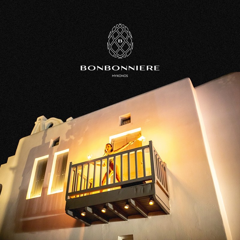 Bonbonniere nightclub Mykonos view of club corner couch purple blue lights