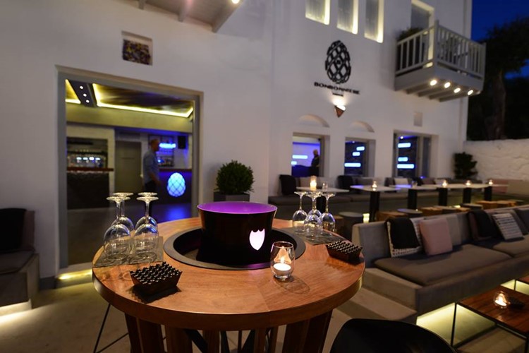 Bonbonniere nightclub Mykonos view of the exterior of the club terrace with couches and tables