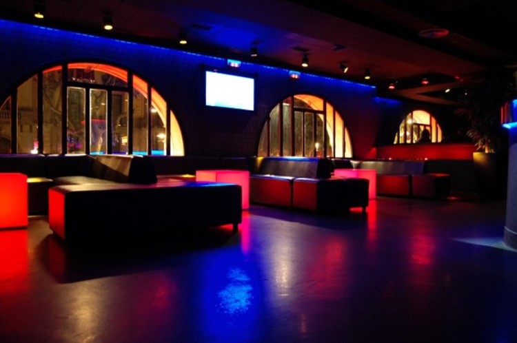 Boulevard nightclub Barcelona view of the interior inside the club modern furniture colored blue and red lights