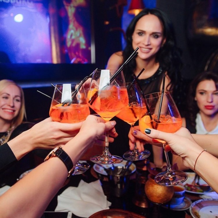 Buddha Bar nightclub Saint Petersburg girls having fun drinks alcohol table service cocktails