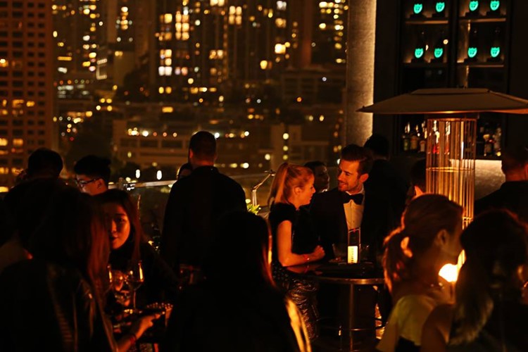 Ce La Vi nightclub Hong Kong outside view crowd at event chatting and drinking