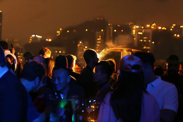 Ce La Vi nightclub Hong Kong crowd at event outside view of the city