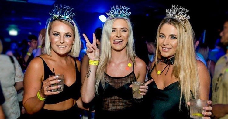 Celon nightclub New York blonde girls having fun dancing partying mini dresses chic formal outfits