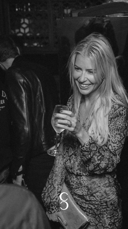 Cafe Chic club in Paris blonde lady in mini summer dress dresscode go out fancy dressup