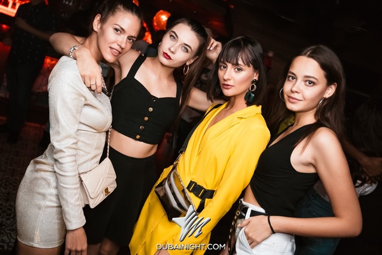 Cartel Dubai nightclub girls pretty mini dresses brunette guest list fun party