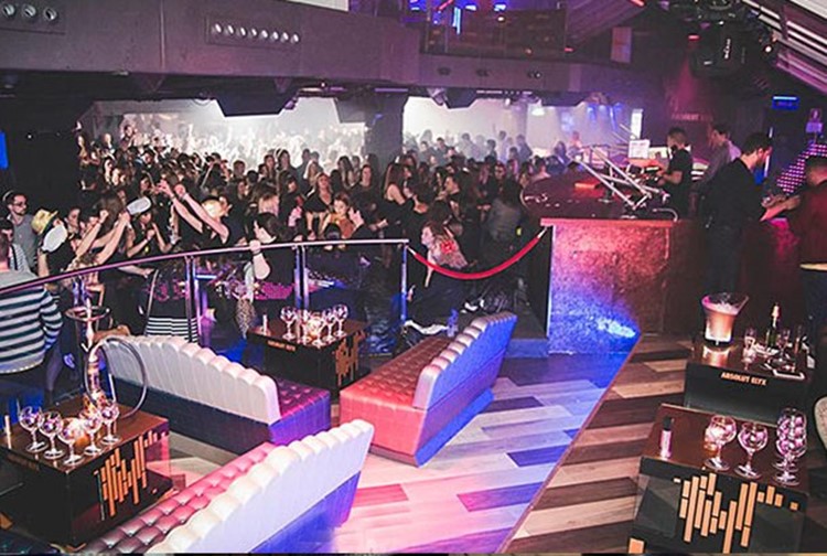 Catwalk nightclub Barcelona party people dancing dj mixing music dancing