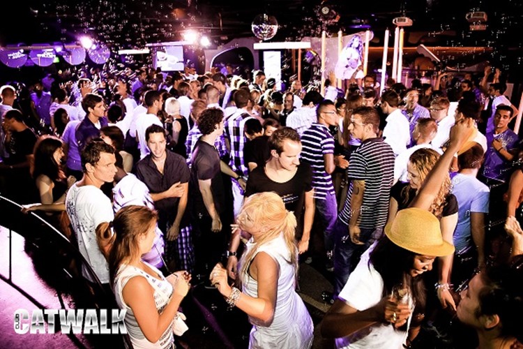 Catwalk nightclub Barcelona crowd drinking dancing partying dance floor