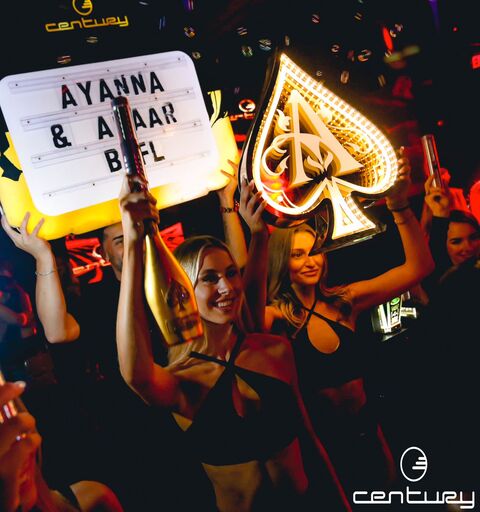 Century nightclub Toronto pretty blonde waitresses bottle parade show celebrate birthday bachelor bachelorette