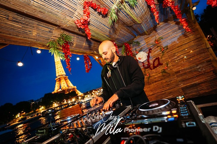 Chez Mila nightclub Paris dj mixing music fun night party casual outside event famous tower amazing view
