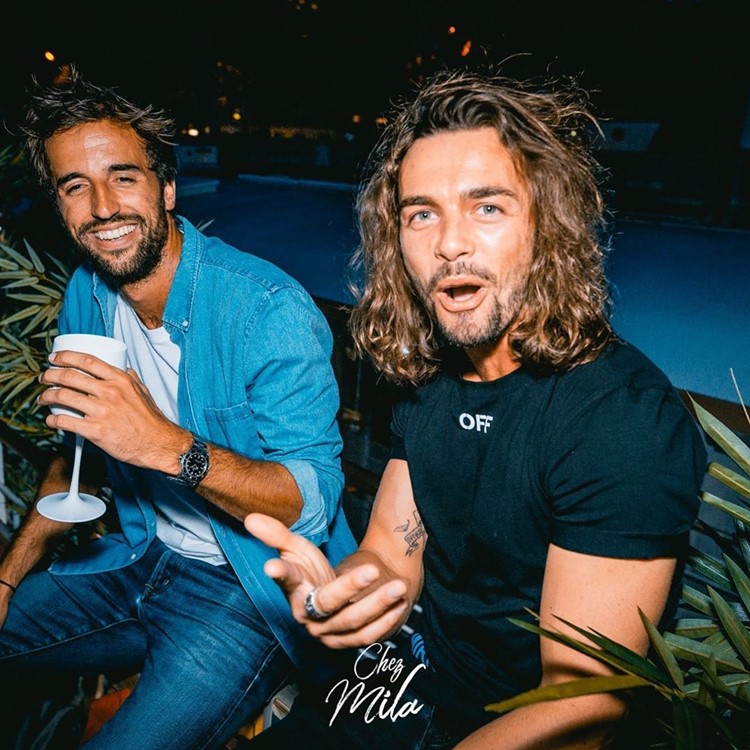 Chez Mila nightclub Paris boat party guys drinking champagne table vip reserve area service packages drinks beverages