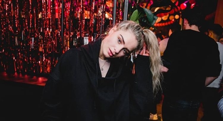 Chin Chin nightclub Amsterdam blonde pretty girl dressed in black dress