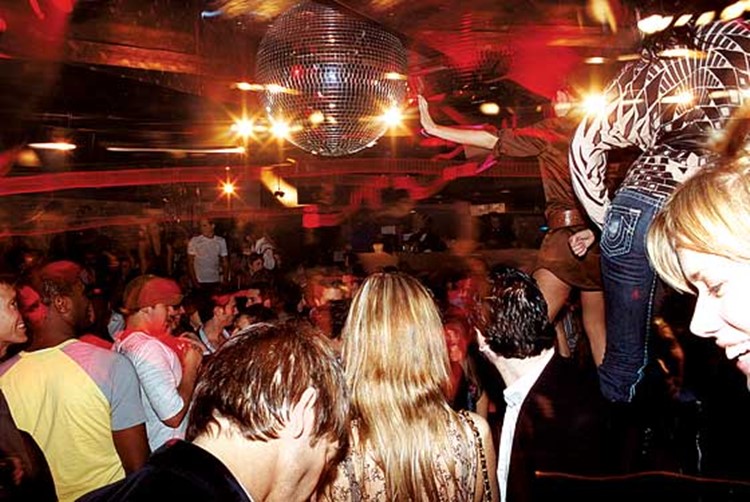 Cielo nightclub New York people dancing having fun drinking