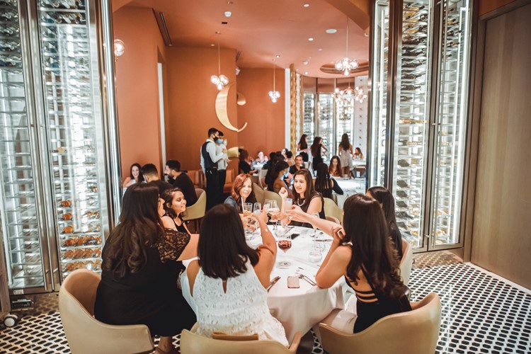 Cinque resturant Dubai club group of ladies having fun dinner eat drink cocktails fine dining italian