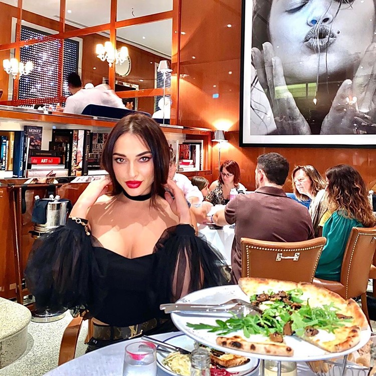 Cipriani Monte Carlo restaurant pretty girl brunette eating pizza food dinner party fun