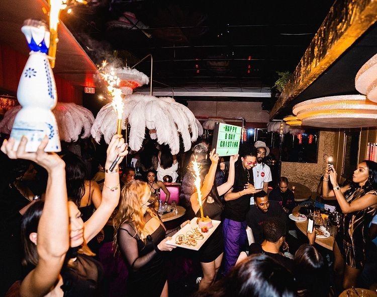 Classic Cat nightclub Los Angeles champagne bubbles parade fun drinks nightout celebration