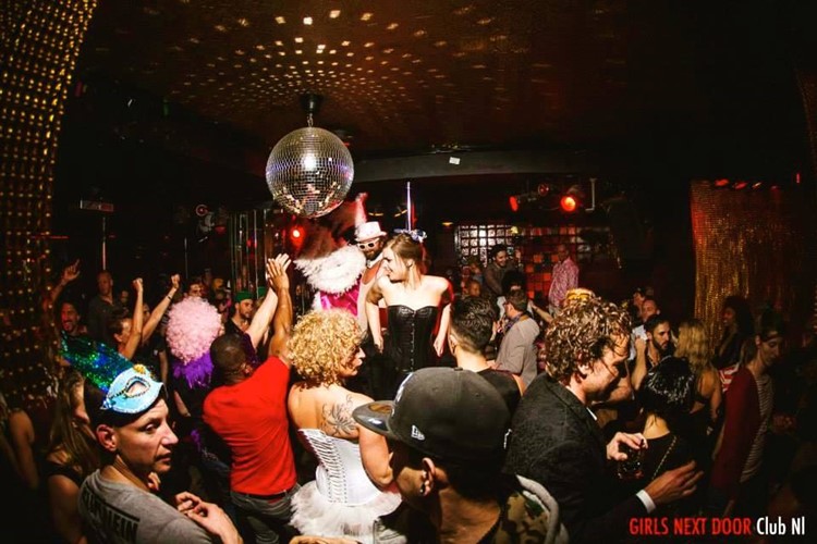 Club NL nightclub Amsterdam crowd having fun disco ball