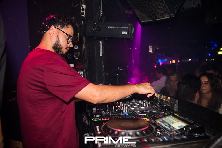 Club Prime nightclub Amsterdam dj mixing music party crowd