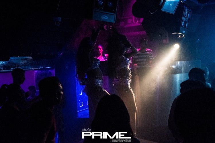 Club Prime nightclub Amsterdam sexy exotic dancers pole dancing wearing white lingerie