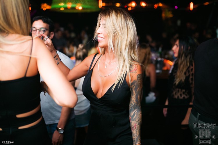 Coco nightclub Tel Aviv sexy blonde girl dancing on the dance floor