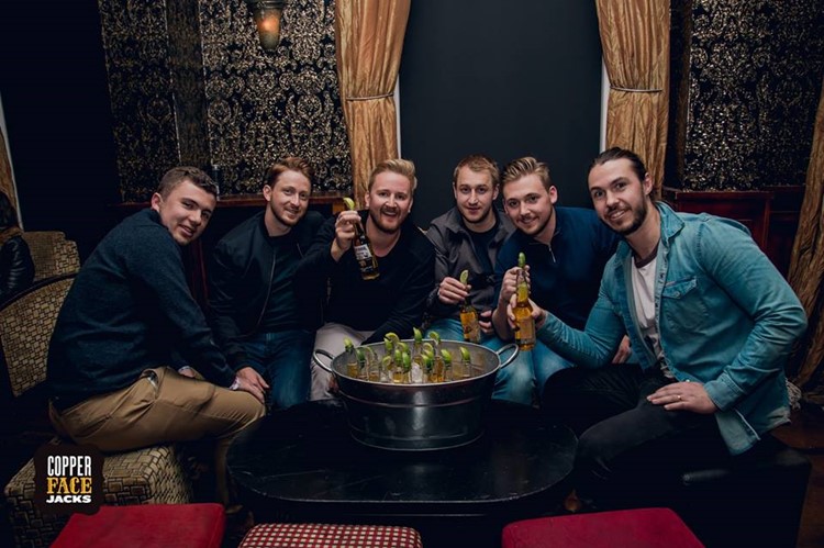 Copper Face Jacks nightclub Dublin table reservation service men guys drinking alcohol bottles