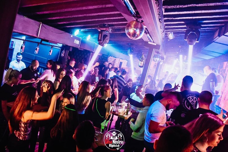 Cosa Nostra nightclub Belgrade dance floor crowd dancing fun party dj mixing music show lights