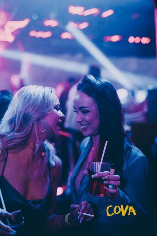 Cova nightclub Paris girl in little mini black dress dresscode fancy dress up tonight go out party