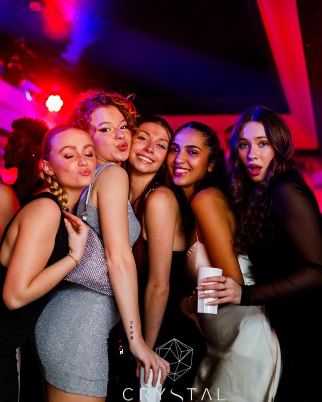 Crystal Lounge nightclub Paris dancers in costumes dance floor party all night concerts dj mixing music