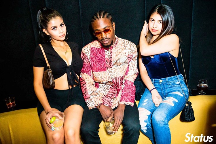 Cube nightclub Toronto sexy brunette girls with man drinking alcohol partying