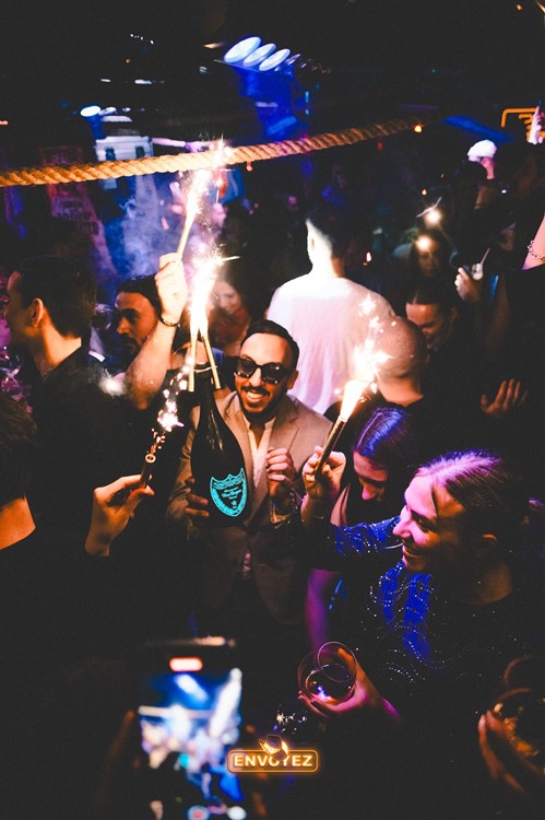 Deflower club Paris bottle parade bubbles champagne dom perignon book now